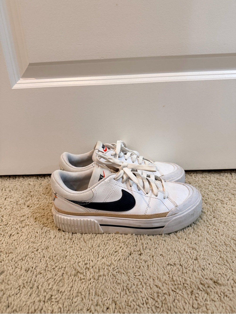 Nike Women’s White Sneakers with Black Swoosh and Tan Trim